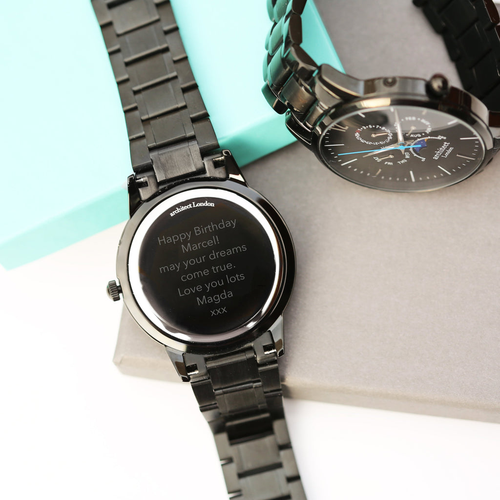 Smartwatch with a message on its screen displayed on a white surface.
