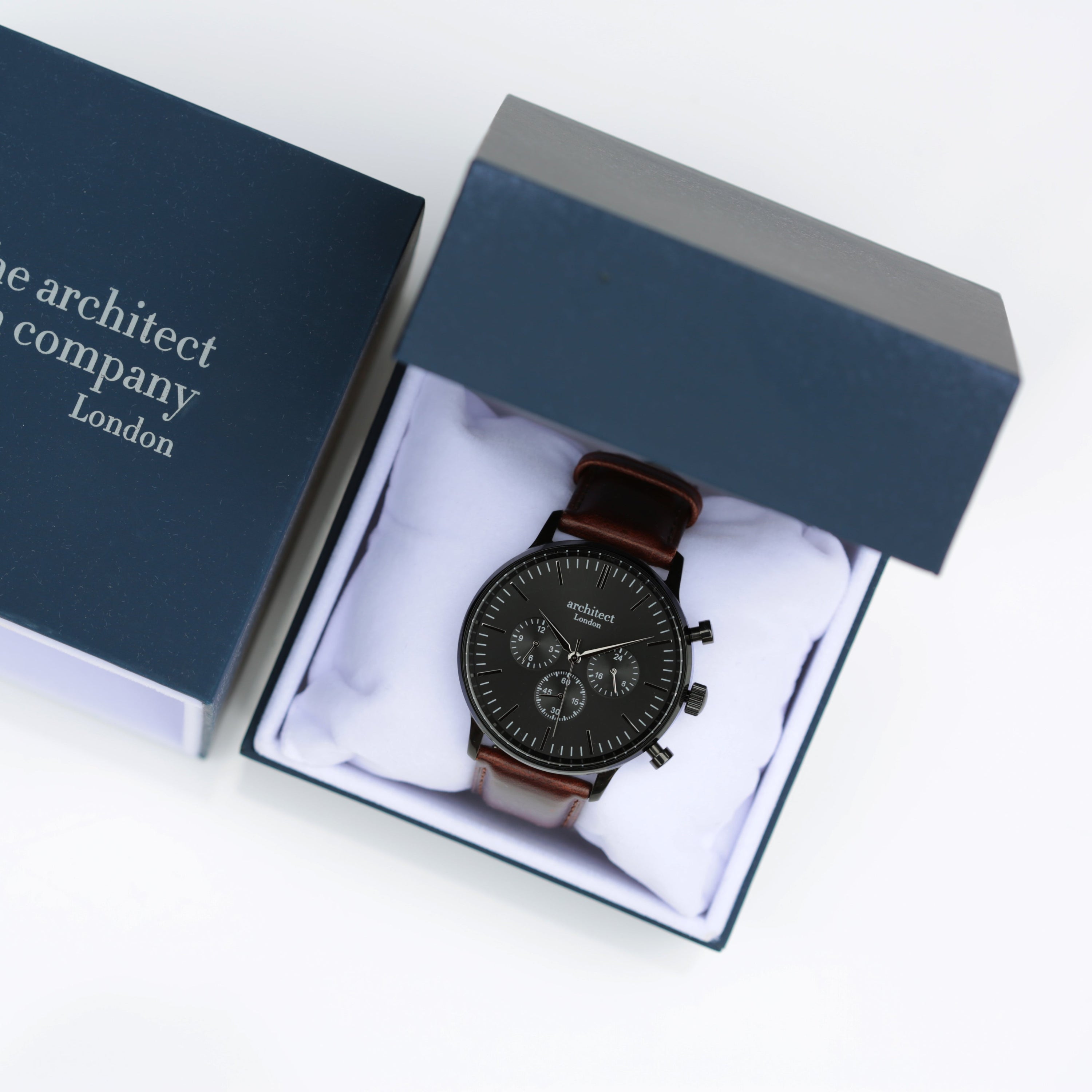 Watch in a branded box on a white background