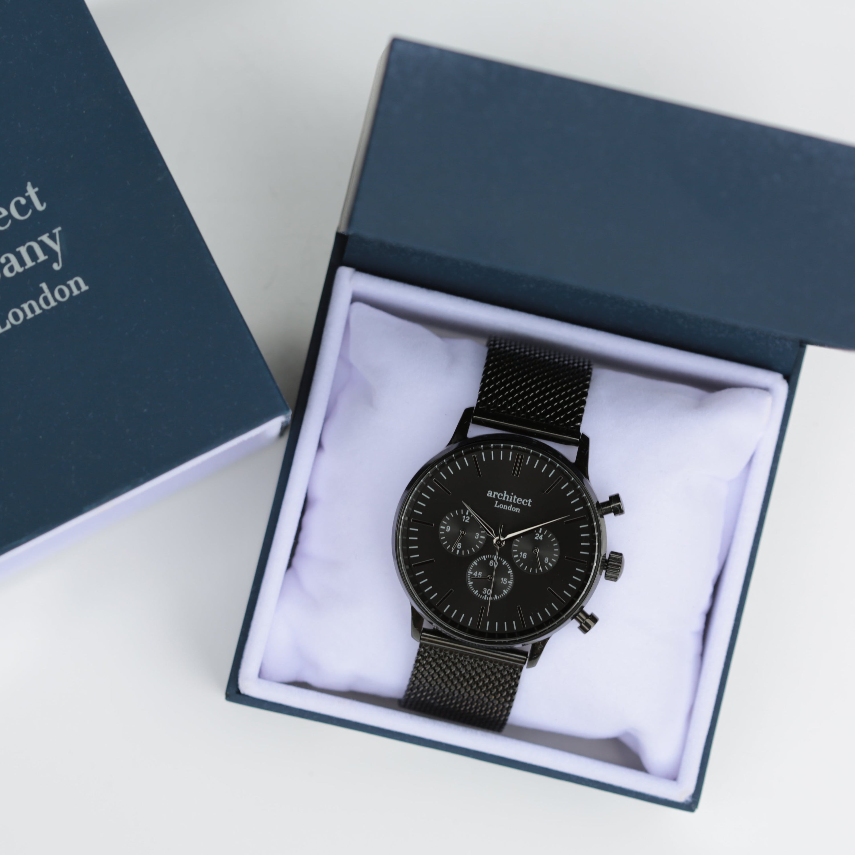 Black watch in a box with 'Architect Company London' branding