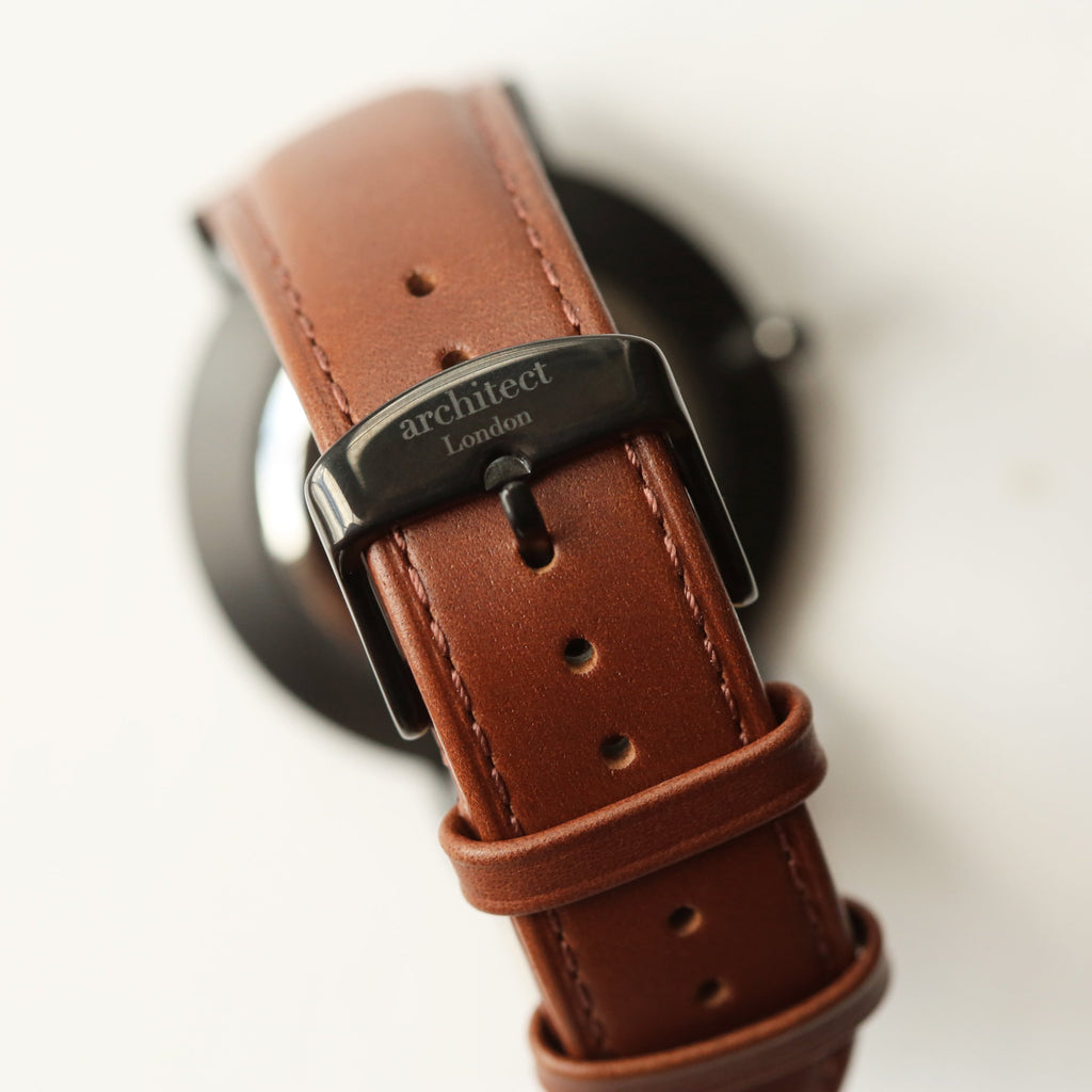 Brown leather watch strap with 'architect London' buckle on a white background