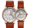 Two watches with brown leather straps and rose gold cases on a white background