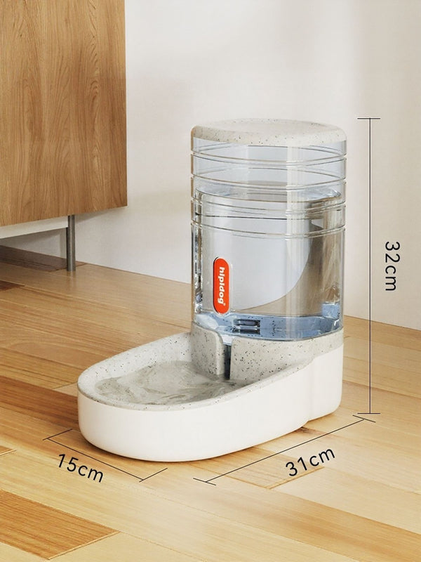 Pet water fountain with dimensions on a wooden floor