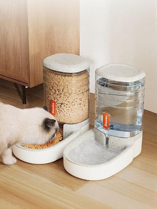 Pet feeding and water station with a dog eating from a bowl on a wooden floor.

