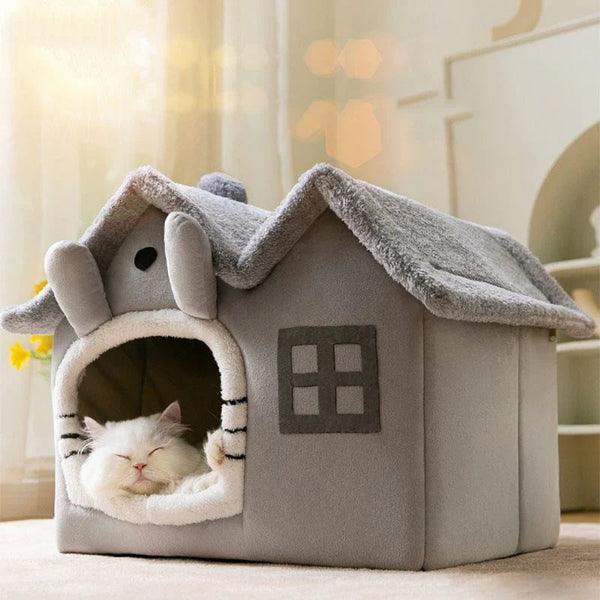 Cat sleeping in a cozy gray pet house with a small window and rounded entrance.

Details