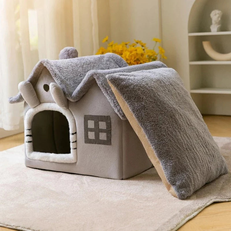 Cat house with a sloping roof in a cozy room setting