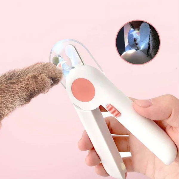 Pet grooming tool with a close-up inset on a pink background