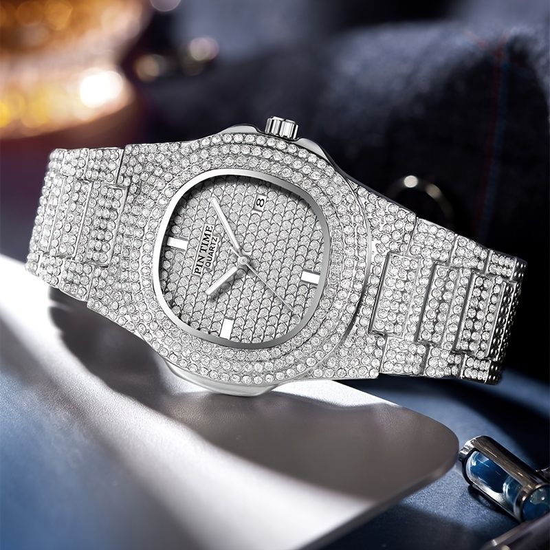Luxury diamond-encrusted watch on a reflective surface
