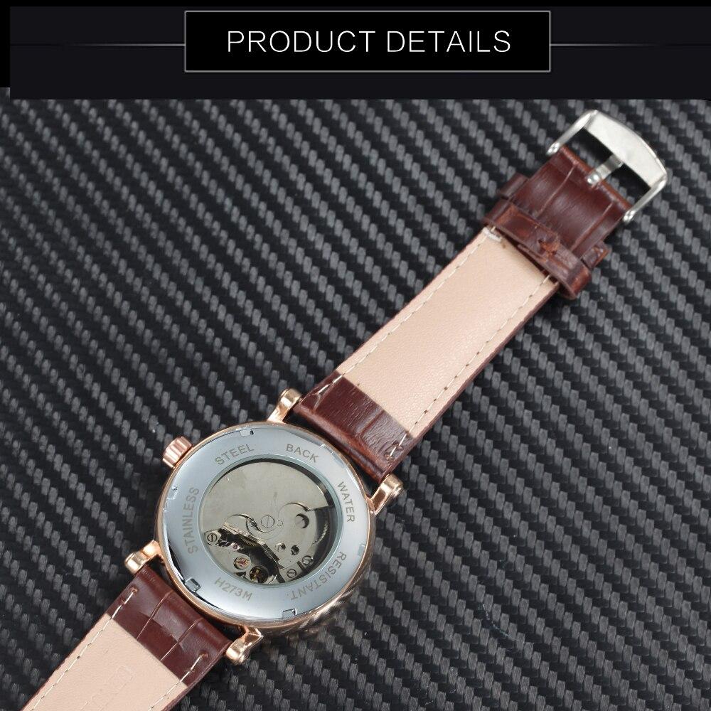 Watch with brown leather strap and visible mechanism on a carbon fiber background
