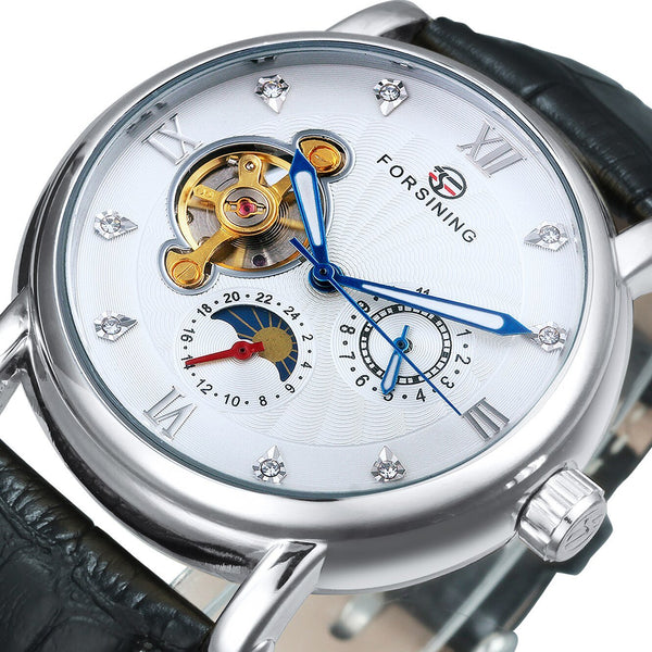Luxury Forsining watch with intricate design and visible brand name.