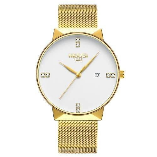 Gold wristwatch with a white face on a white background