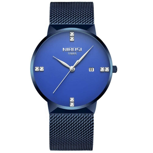 Blue watch with mesh band on a white backgroundBlue watch with mesh band on a white background