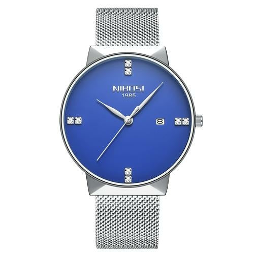 Silver watch with blue face and mesh band on a white background