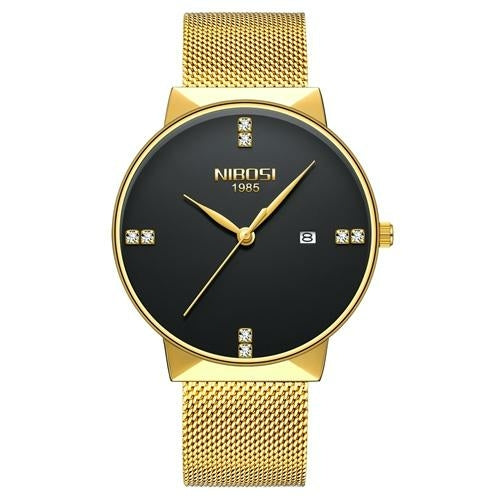Gold watch with black face and mesh band on a white background