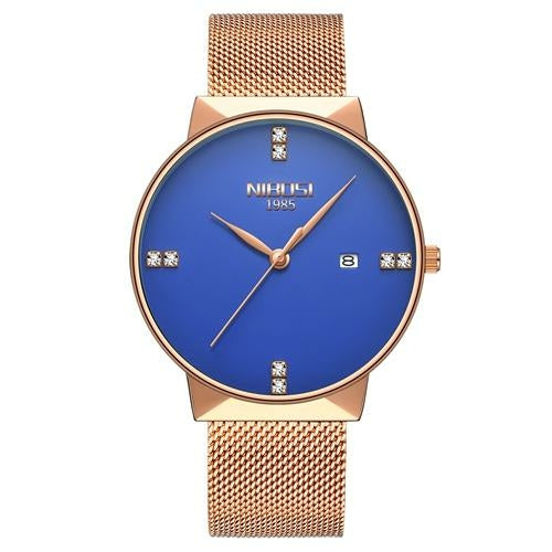 Wristwatch with blue face and rose gold mesh band on a white background